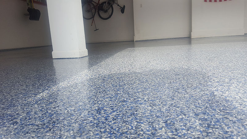 Epoxy garage floors done by Elite Epoxy Floors are tough and durable.