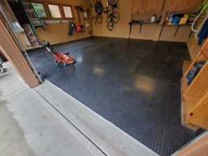 A durable epoxy garage floor will require at least two coats, and be cured overnight between them.